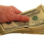 handing over money e1303825415940 150x150 Going Green is the New Black